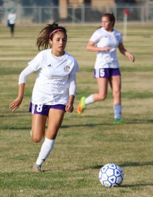 Samantha Bustamante eyes the goal in a first round game in the Lemoore Lady Tiger Soccer Tournament.